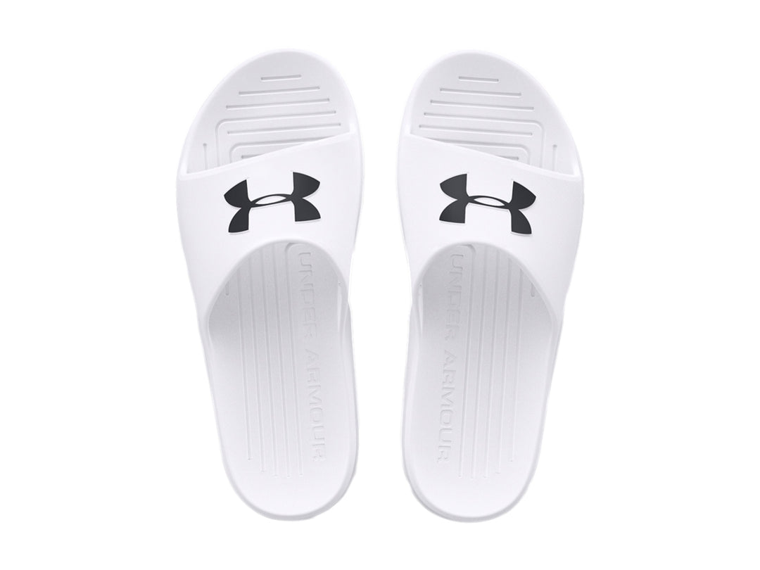 Sandalia Under Armour de color blanco con logo negro en la parte superior, diseño deportivo y suela ancha.