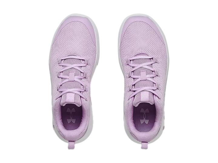 Tenis deportivos Under Armour color morado con suela blanca para niña.
