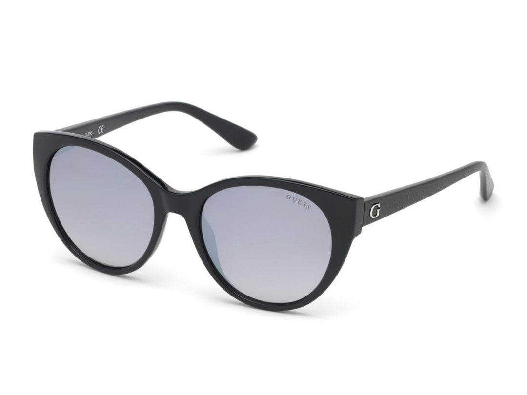 Lentes de sol Guess modelo 7594 01C de color negro con cristales grisáceos.