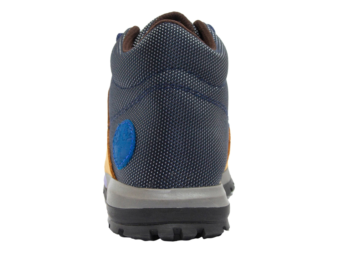 Zapato tipo bota para niño en colores amarillo y azul con suela gris oscuro y cordones azules.