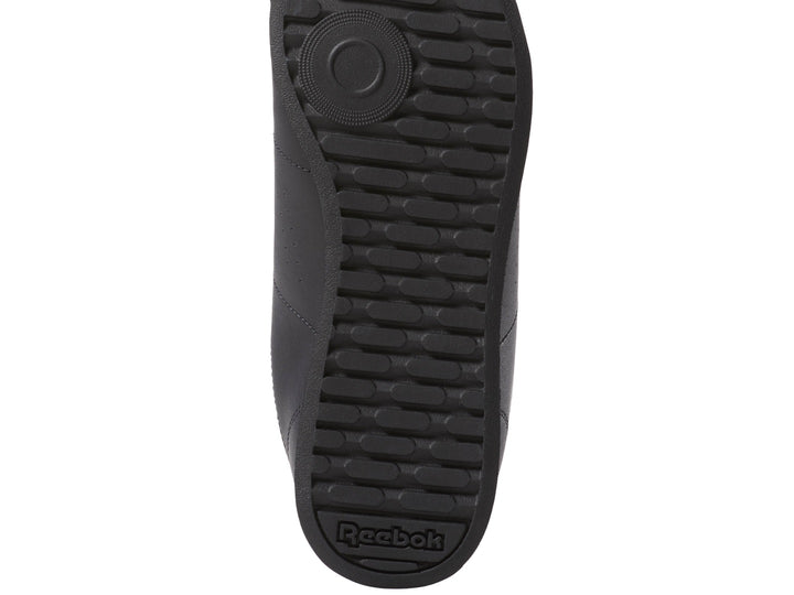 Tenis Reebok Royal Charm para mujer en color negro con logotipo blanco lateral.