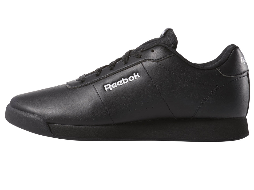 Tenis Reebok Royal Charm para mujer en color negro con logotipo blanco lateral.