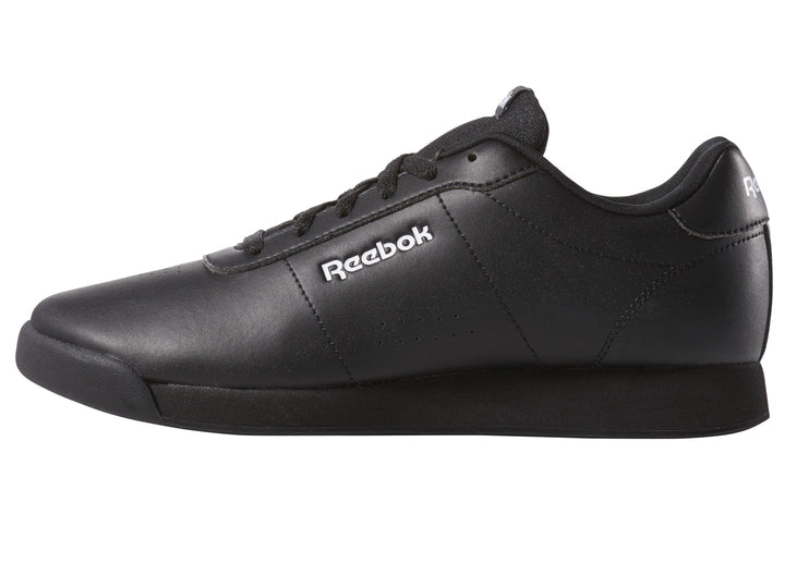 Tenis Reebok Royal Charm para mujer en color negro con logotipo blanco lateral.