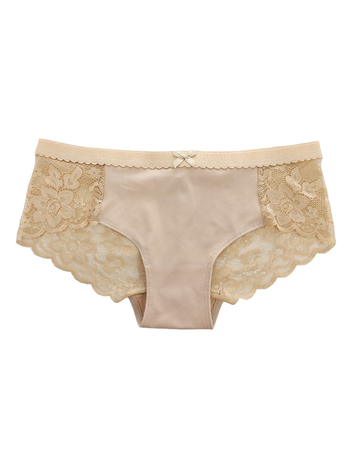 Boxer de mujer color nude con detalles de encaje en los laterales y un pequeño moño en la cintura.
