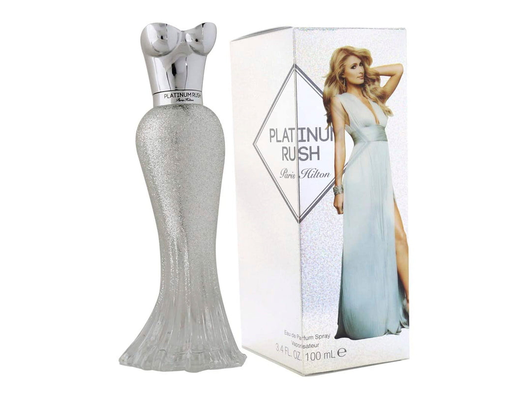 Perfume Paris Hilton Platinum Rush para mujer con botella plateada brillante y su caja blanca.