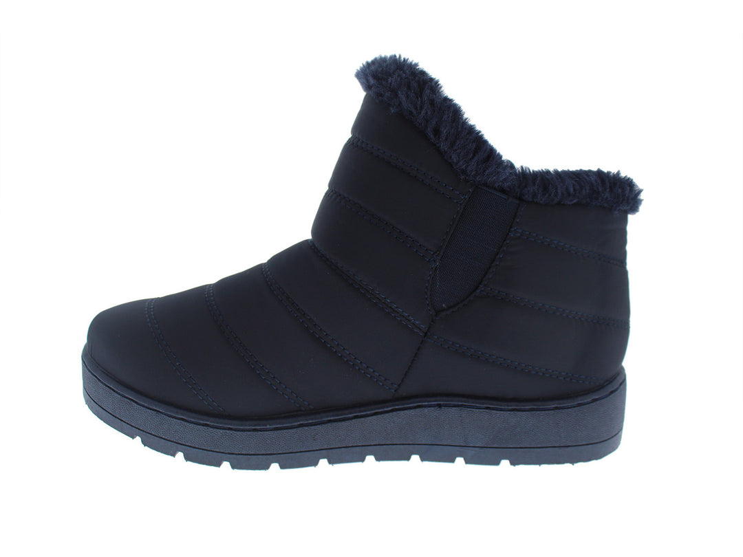 Botas Furor color azul navy con diseño acolchado y forro interior de piel sintética para invierno.