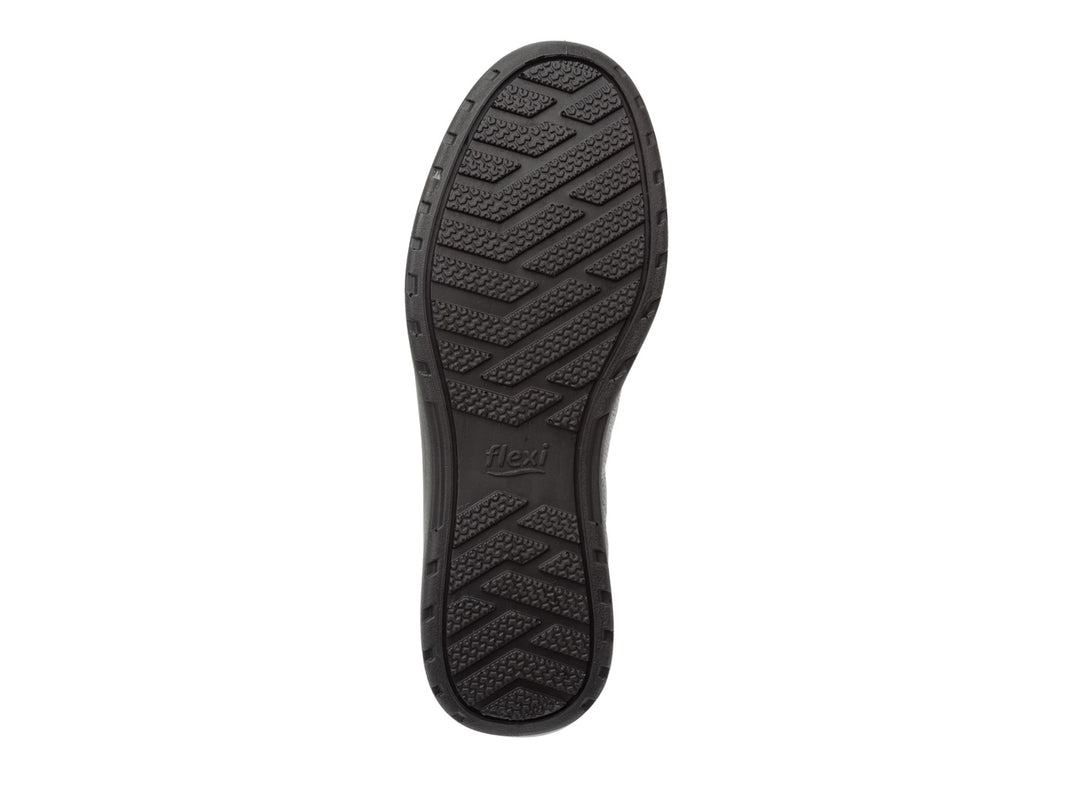 Zapato plano Flexi Traviata para mujer en color negro, diseño slip-on con acabado en cuero.