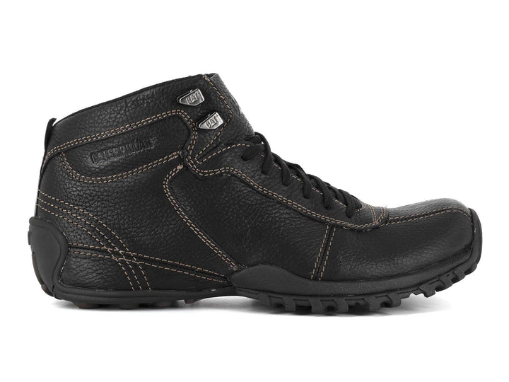 Botín Caterpillar de cuero negro con costuras cafés y suela robusta para hombre.