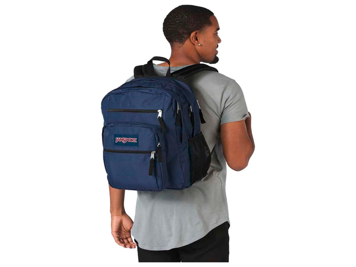 Mochila escolar JanSport Big Student en color azul marino con bolsillo frontal y logotipo.