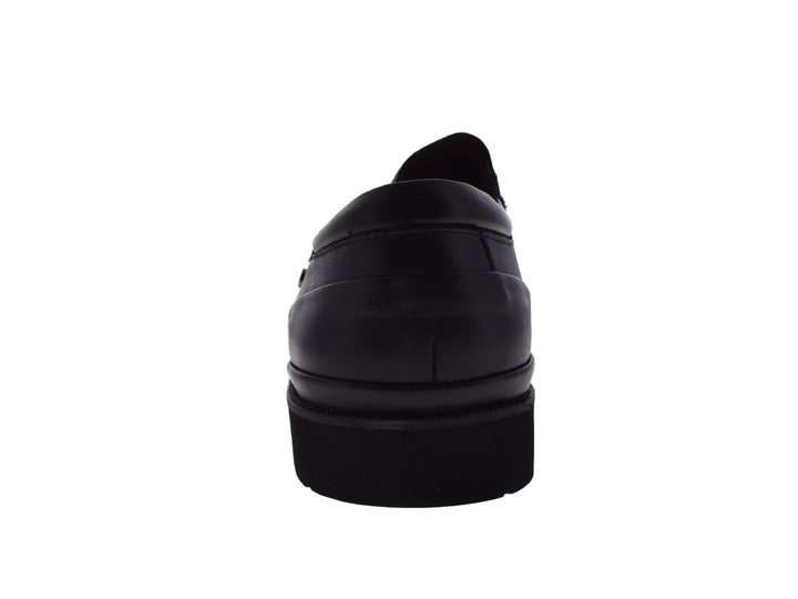Zapato formal para hombre de color negro, material de cuero liso y diseño sin cordones.