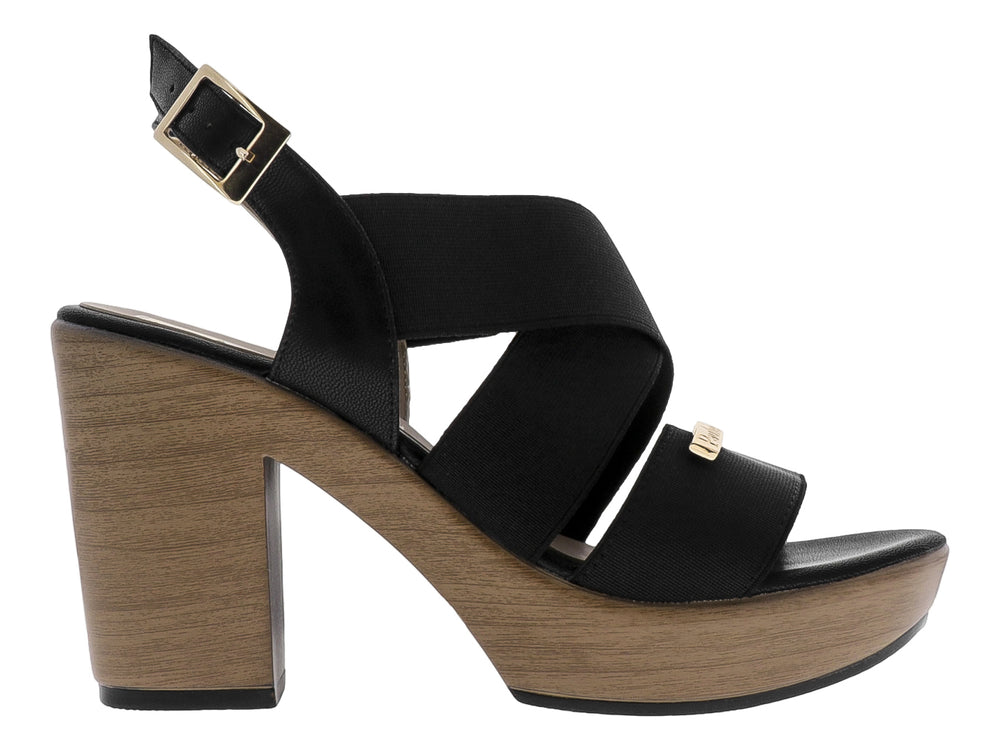 Sandalia Paulie color negro con plataforma y tacón en tono ébano, diseño de correas cruzadas y cierre con hebilla.