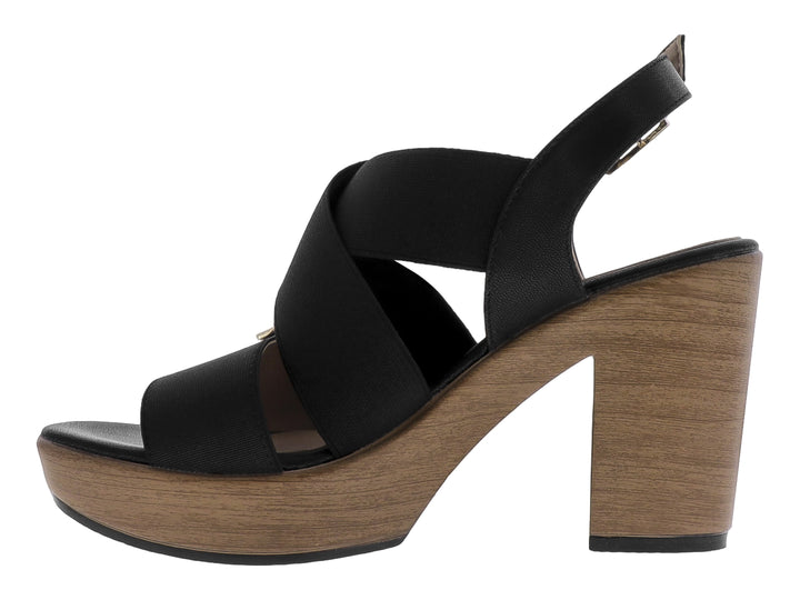 Sandalia Paulie color negro con plataforma y tacón en tono ébano, diseño de correas cruzadas y cierre con hebilla.