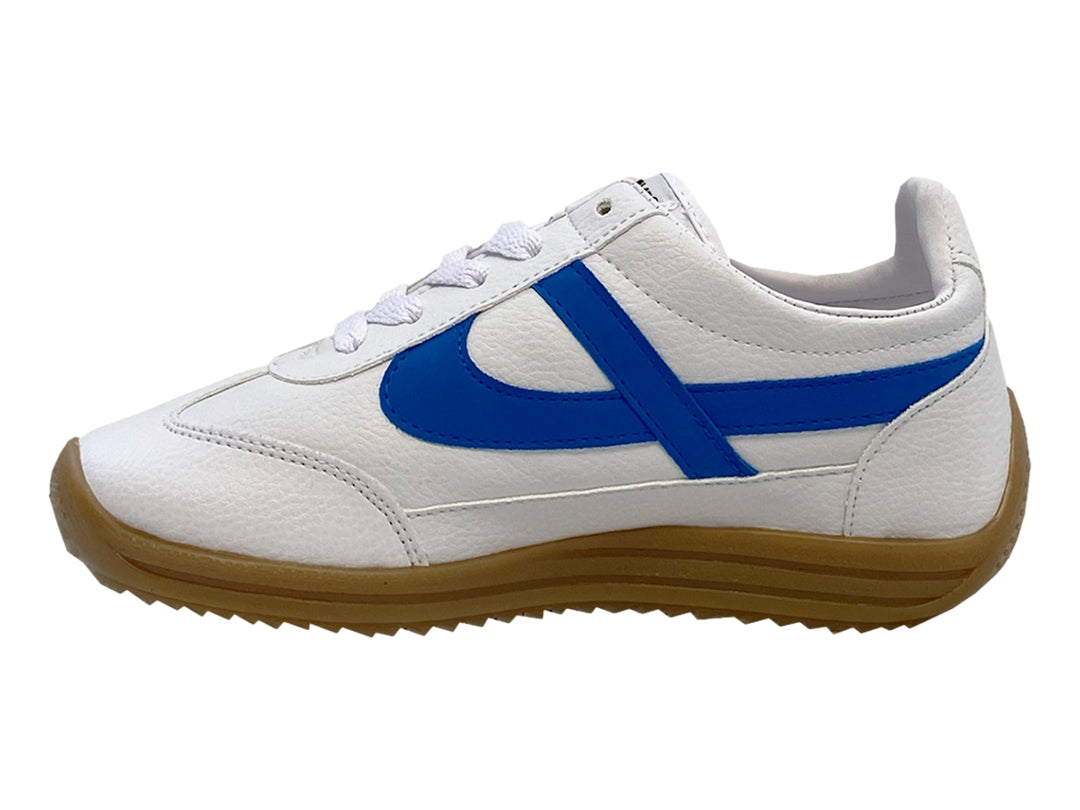 Tenis Panam para niño color blanco con franja azul y suela color miel.