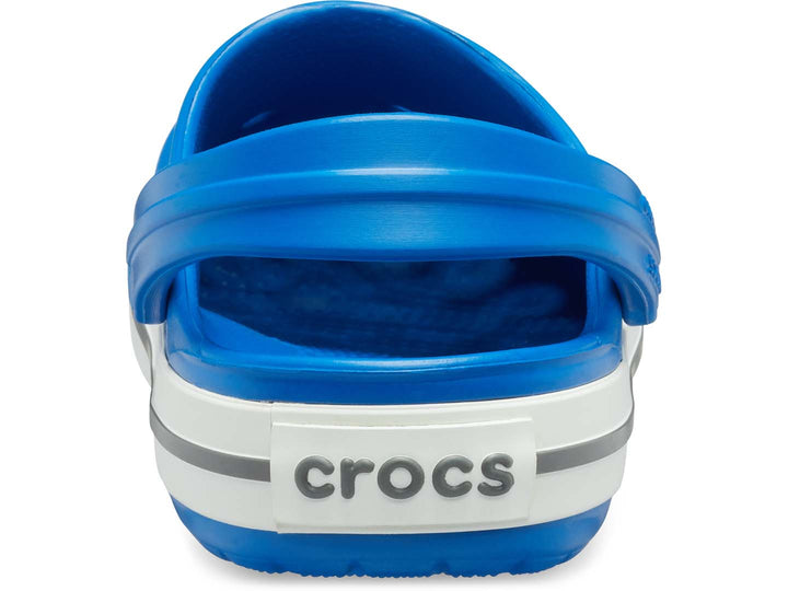 Zuecos Crocs Crocband para niño en color azul brillante con franja blanca y gris en la suela.
