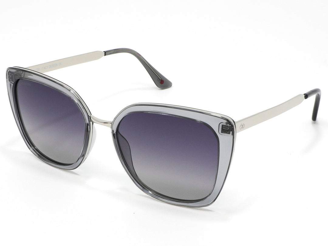 Lentes de sol para mujer Cloe con marco plateado y micas en degradado gris.