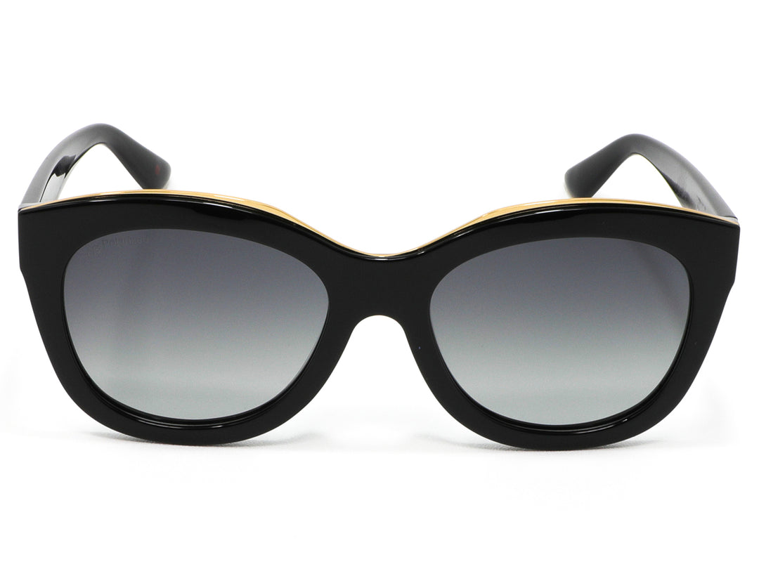 Lentes de sol Cloe para mujer en color negro con detalle dorado superior y micas degradadas.