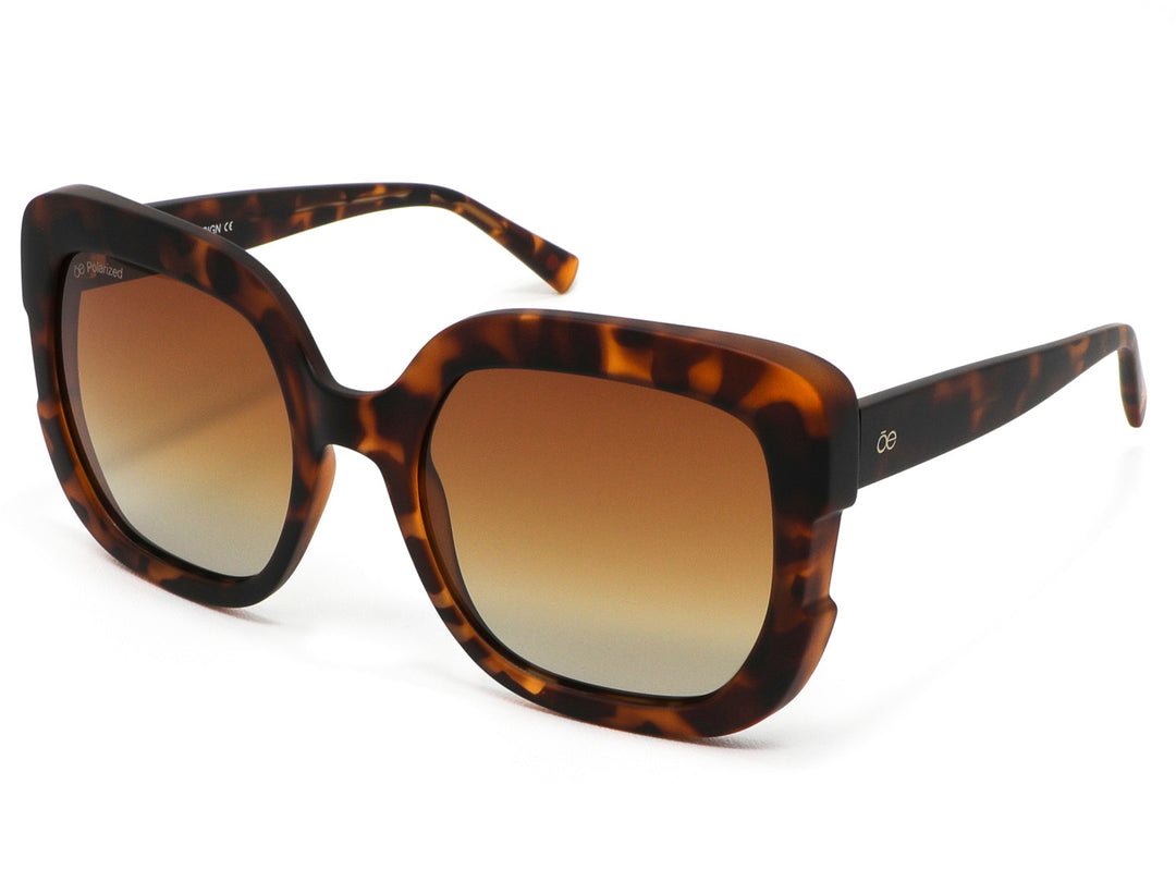Lentes de sol para mujer Cloe color carey con armazón cuadrado y micas degradadas en color marrón.