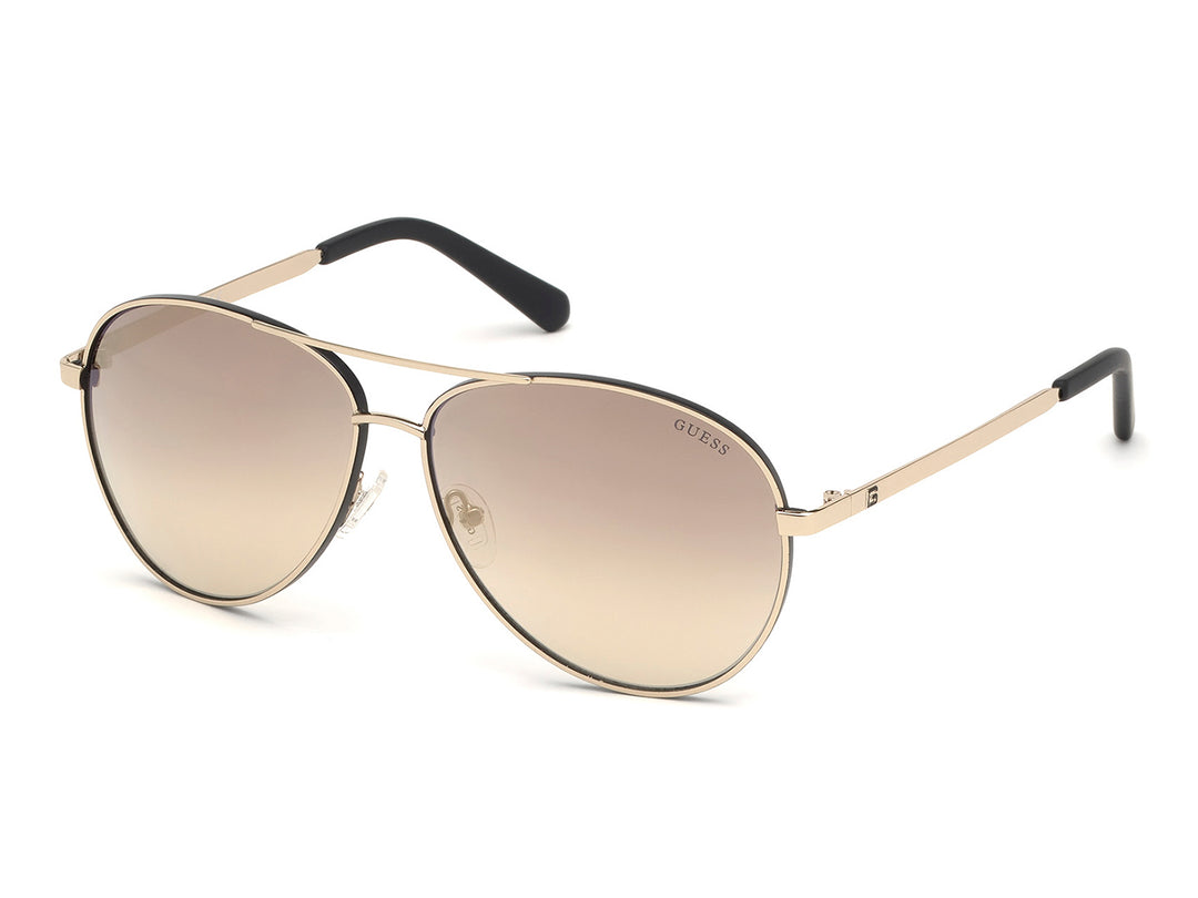 Lentes de sol Guess estilo aviador color dorado con micas degradadas y terminales negros.