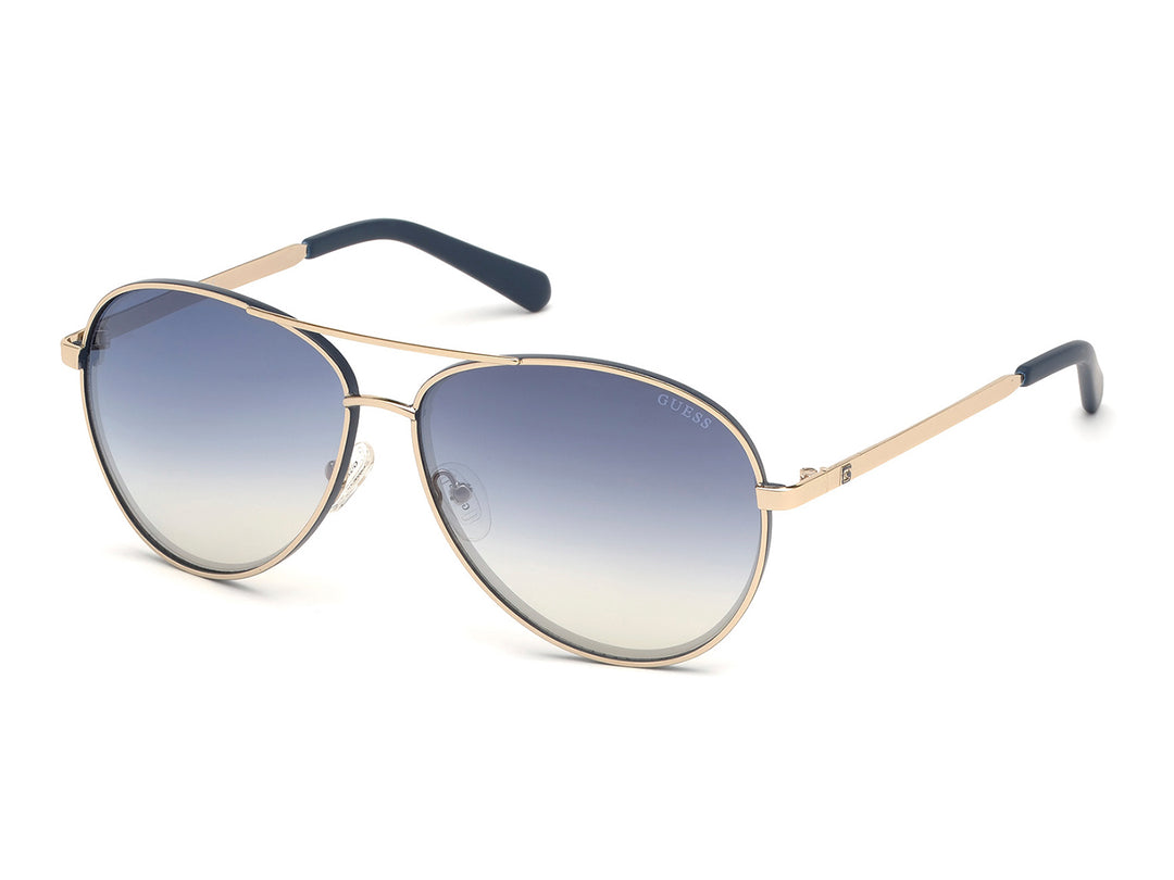 Lentes de sol Guess para hombre con montura dorada y cristales en degradado azul.