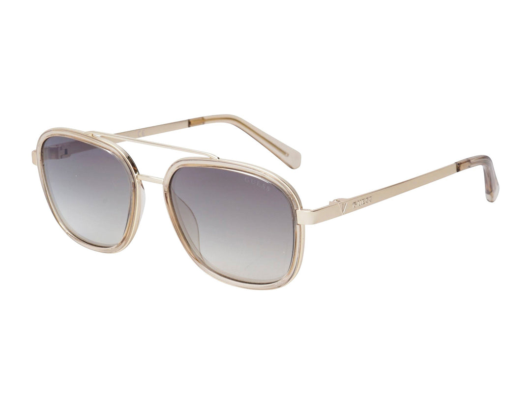 Lentes de sol Guess con montura metálica dorada y cristales en degradado de gris.