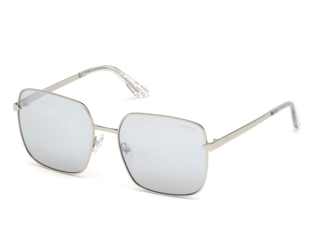 Lentes de sol Guess para mujer con montura metálica plateada y cristales en tono azul claro.