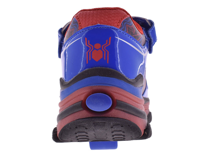 Tenis deportivos para niños en colores rojo y azul con diseño temático y cierre de velcro.