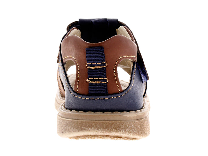 Sandalia para niño marca Coloso en colores azul marino y café con suela beige.