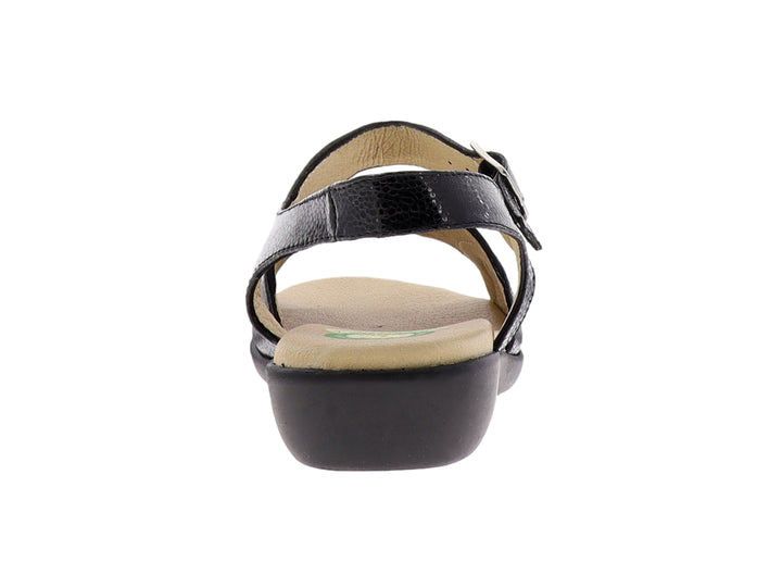 Sandalia negra con correa ajustable y hebilla metálica, plantilla en tono beige.