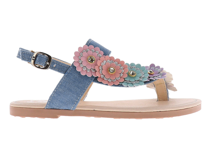 Sandalias de mezclilla azul para niña con aplicaciones de flores multicolores y suela plana beige.