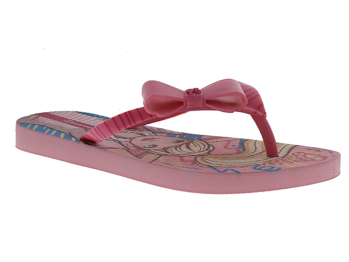 Sandalias rosas para niña con moño decorativo y estampado de Barbie en la plantilla.