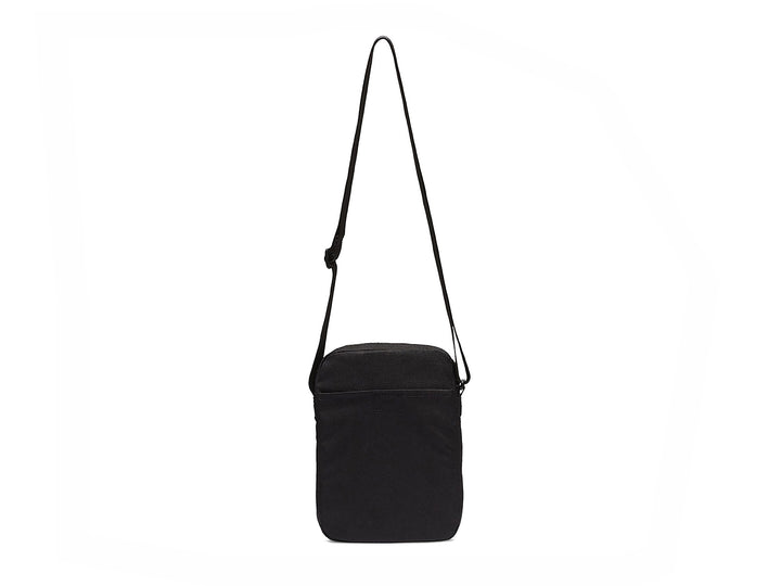 Bolso pequeño Nike Tech de color negro con correa ajustable y cierres frontales.