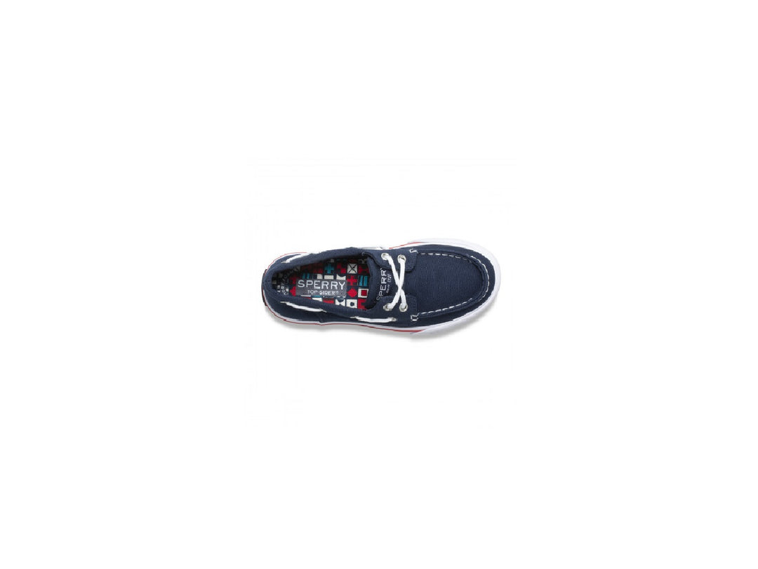 Zapato náutico Sperry azul marino para niño con suela blanca y un detalle en rojo.
