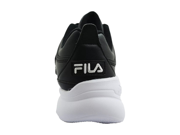Tenis FILA negros con suela blanca gruesa y diseño deportivo.