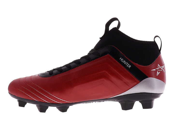 Botín de fútbol Leon Trucco Hunter en color rojo y negro con tacos para pasto.