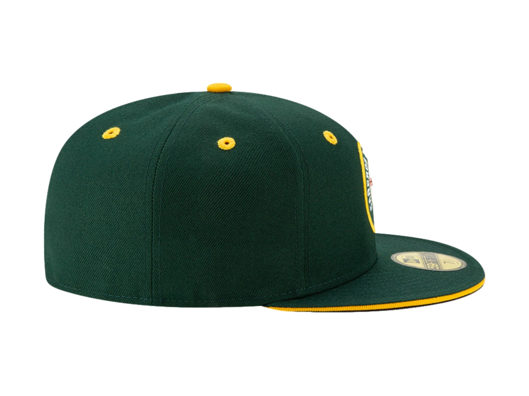 Gorra de béisbol New Era color verde oscuro con detalles amarillos y logo de Cañeros de Los Mochis.