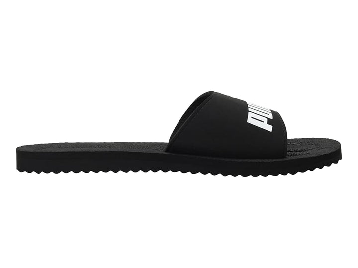 Sandalias PUMA PureCat en color negro con logotipo blanco en la banda superior.