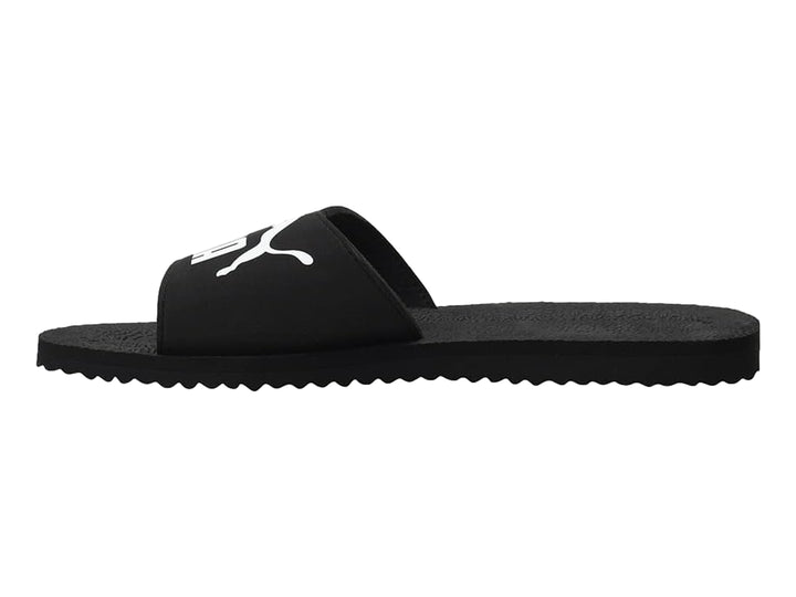 Sandalias PUMA PureCat en color negro con logotipo blanco en la banda superior.