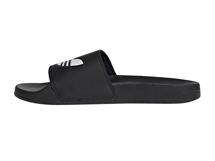 Sandalia Adidas Adilette Lite en color negro con logo blanco en la banda superior.