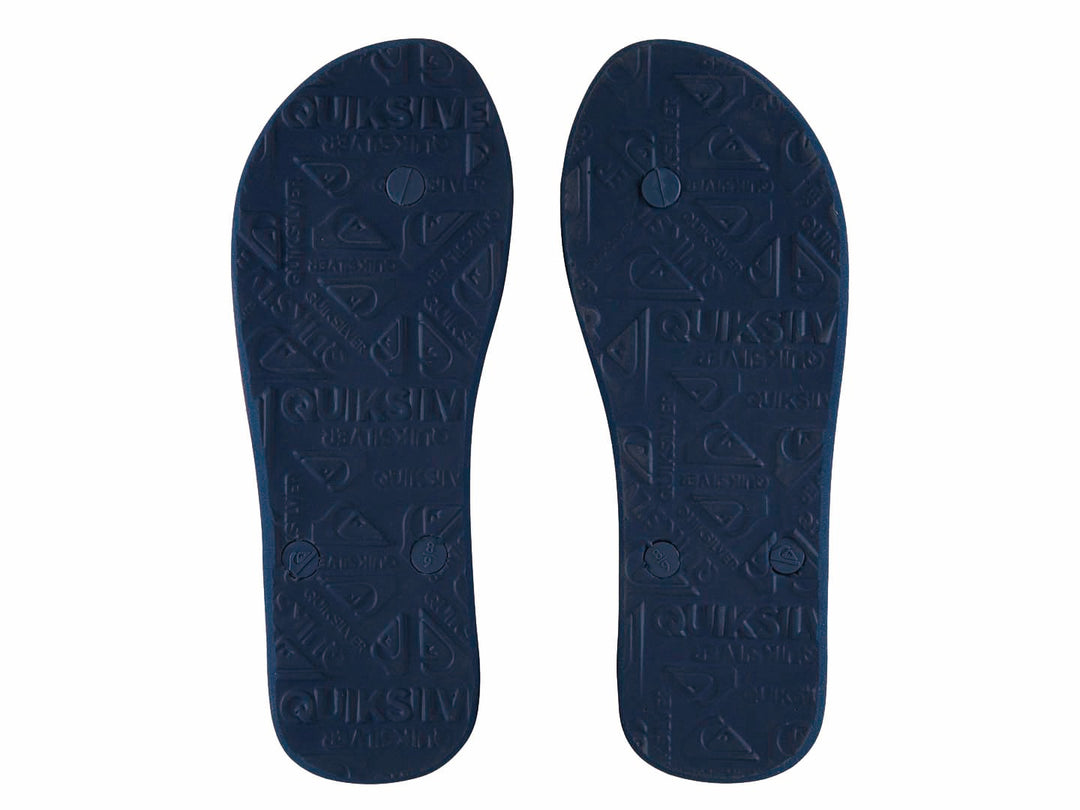 Sandalias Quiksilver en colores rojo y azul con diseño plano y casual.