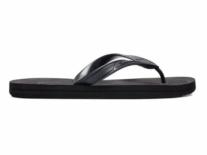 Sandalias Quiksilver color negro sólido con correa en Y y suela plana.