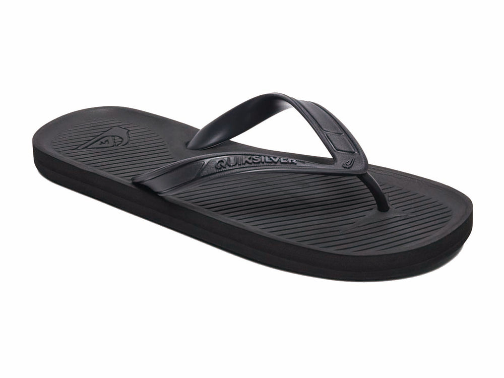Sandalias Quiksilver color negro sólido con correa en Y y suela plana.