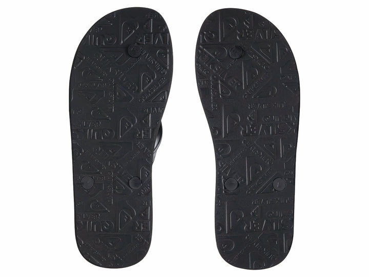Sandalias Quiksilver color negro sólido con correa en Y y suela plana.