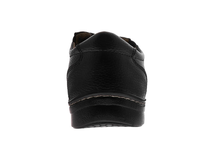 Zapato casual negro con cordones y costuras blancas decorativas en la suela.