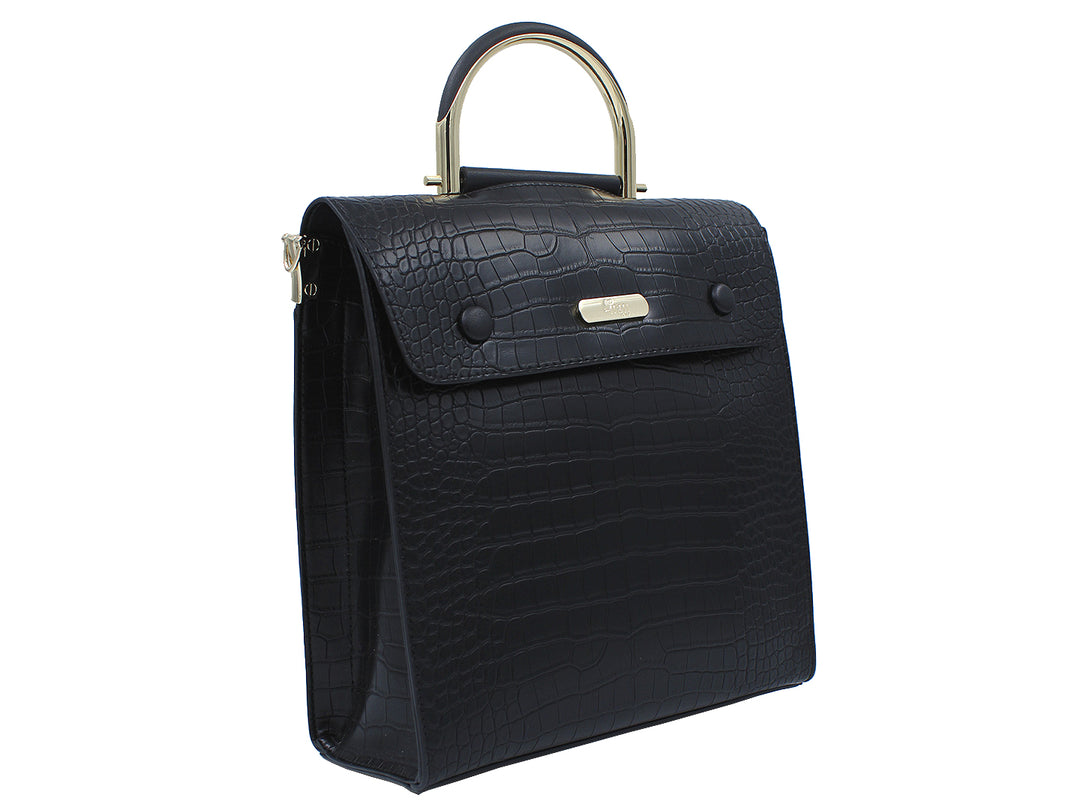 Bolso negro con textura de cocodrilo, asa superior y detalles metálicos dorados.