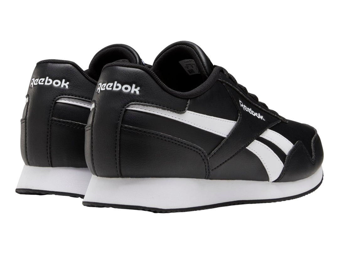 Tenis deportivos Reebok Royal CL Jogger 3 color negro con franjas y suela blanca.