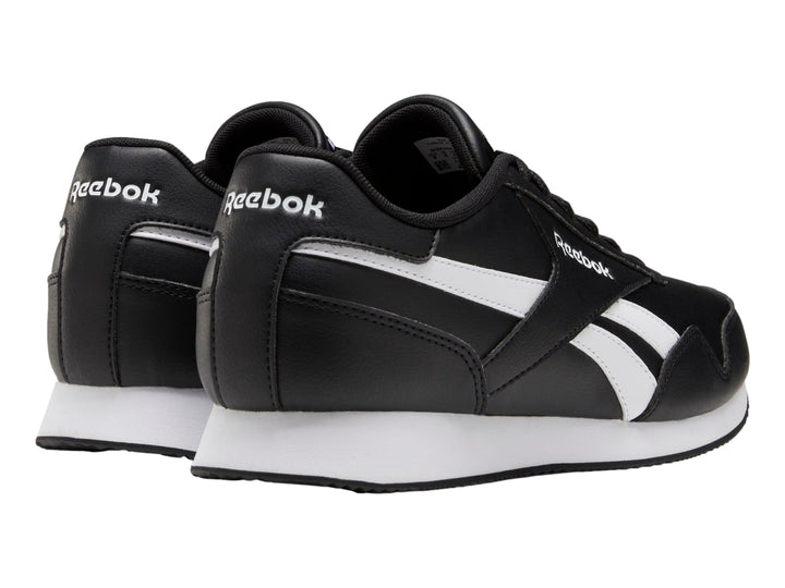 Tenis deportivos Reebok Royal CL Jogger 3 color negro con franjas y suela blanca.