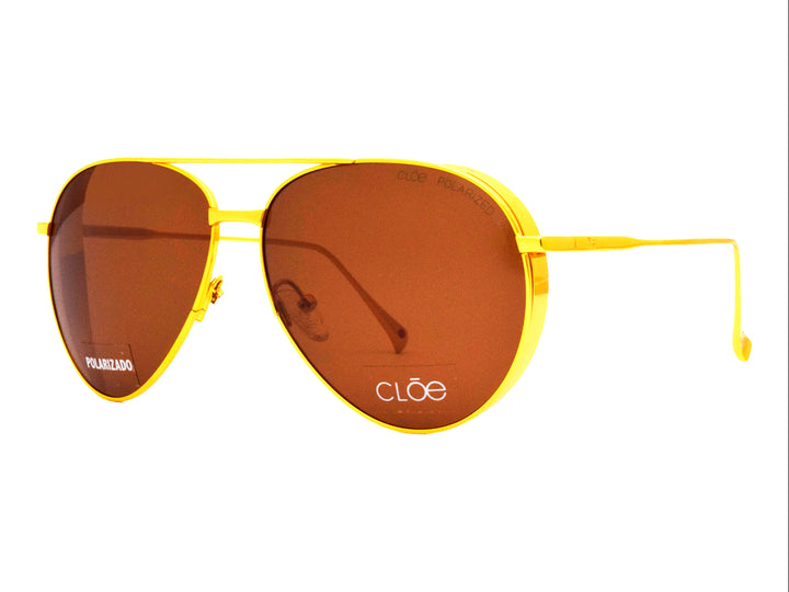 Lentes de sol estilo aviador Cloe con armazón dorado y cristales marrones polarizados.