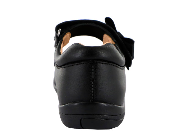 Zapato escolar negro para Niña con moño decorativo y correa de ajuste.