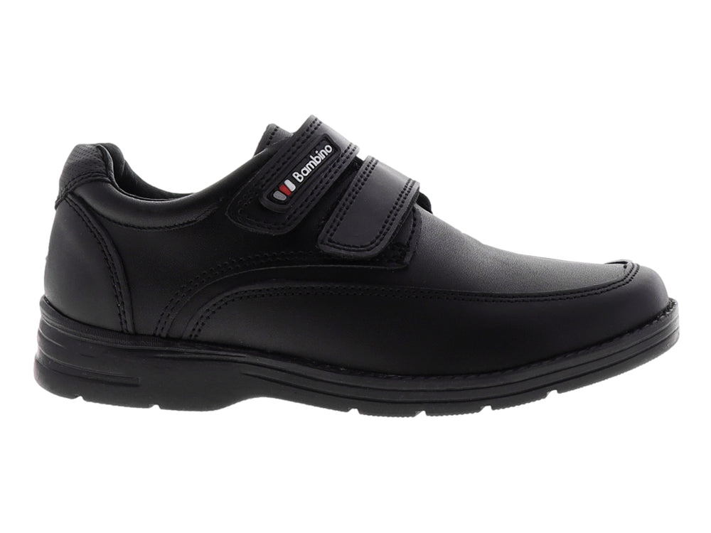 Zapato negro para niño con correa de velcro y suela negra.