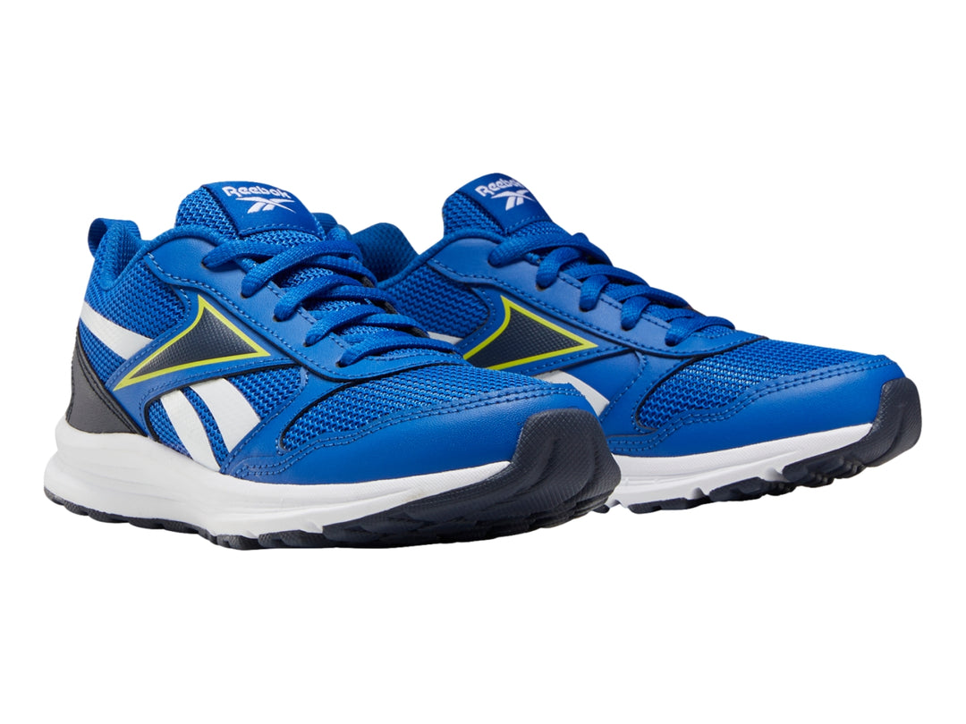 Tenis deportivos Reebok color azul con detalles en azul marino y amarillo y suela blanca.